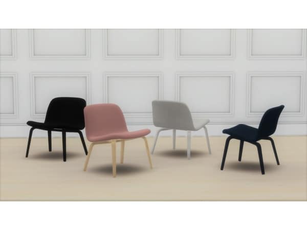 Visu Elegance: Muuto’s Upholstered Lounge Chair (Accessories for Modern Living Spaces)
