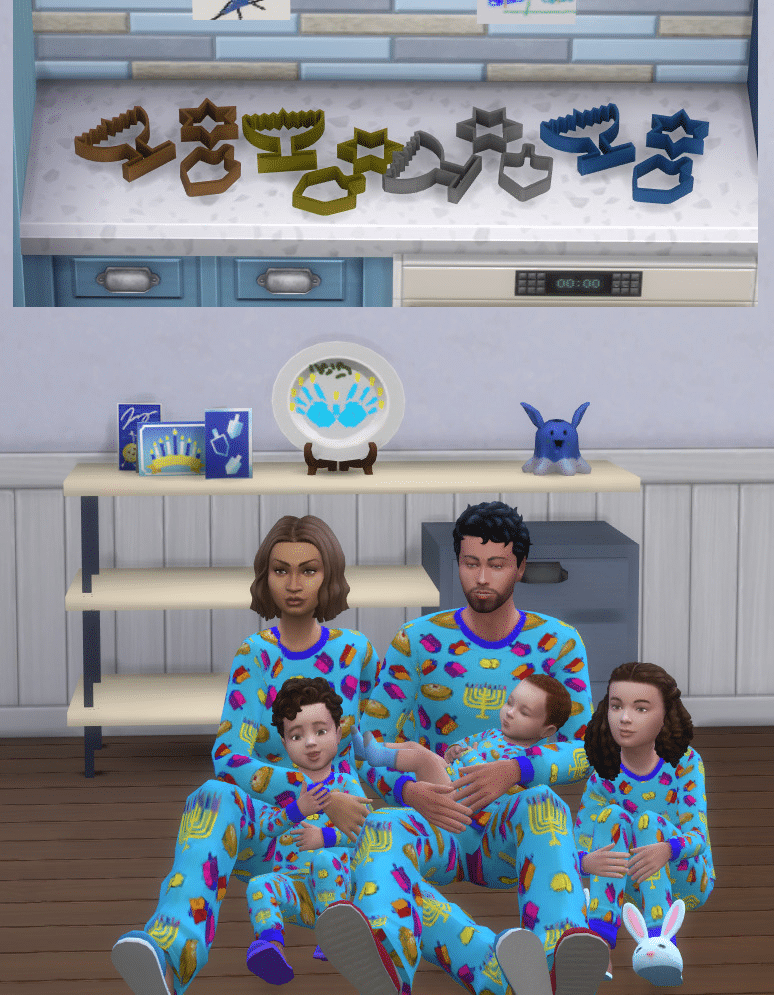 Two images in one. On top is a kitchen counter with an assortment of Hanukkah-themed cookie cutters (such as a menorah and dreidel). On the bottom is a family of 2 adults, 1 child, 1 toddler, and 1 infant wearing matching pajamas which are light blue and covered in a colorful Hanukkuh motif.