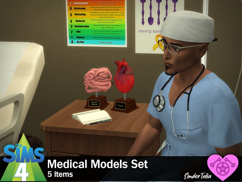 A sim doctor sat beside a wooden table which has a model of the small intestine and a model of a heart and a book atop it.