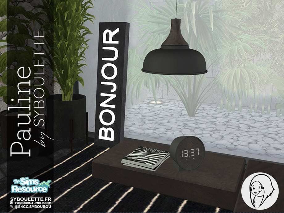 A bedroom space. The focal point is a low black table atop which sits a round black digital clock beside a stack of magazines. A black pendant lamp hangs down from above. To the side of the table is a sign saying "bonjour" laid on its side and a potted plant.